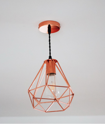 Modern pear-shaped wireframe light fixture.